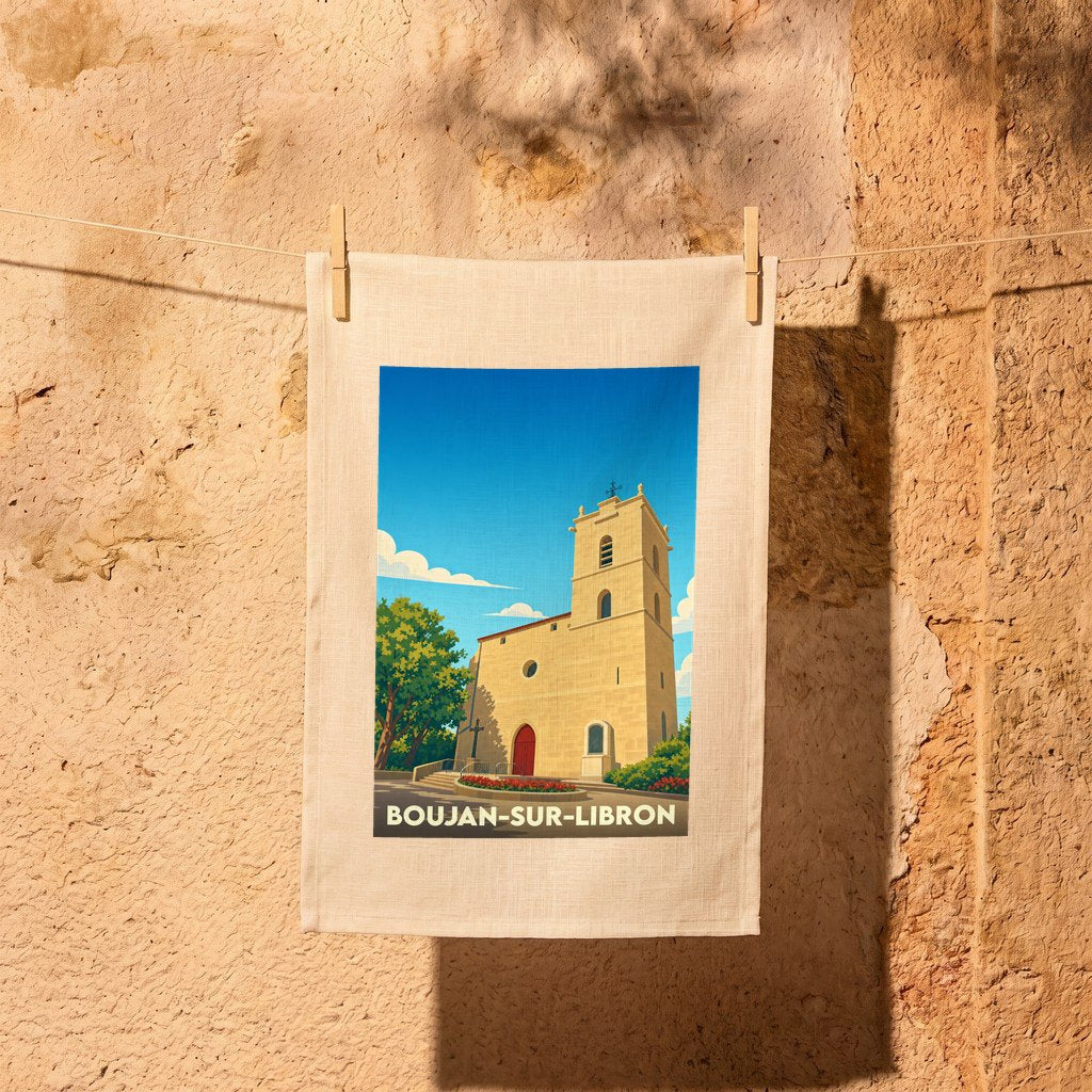 Torchon souvenir de la ville de Boujan-sur-Libron avec une illustration stylisée de son église.