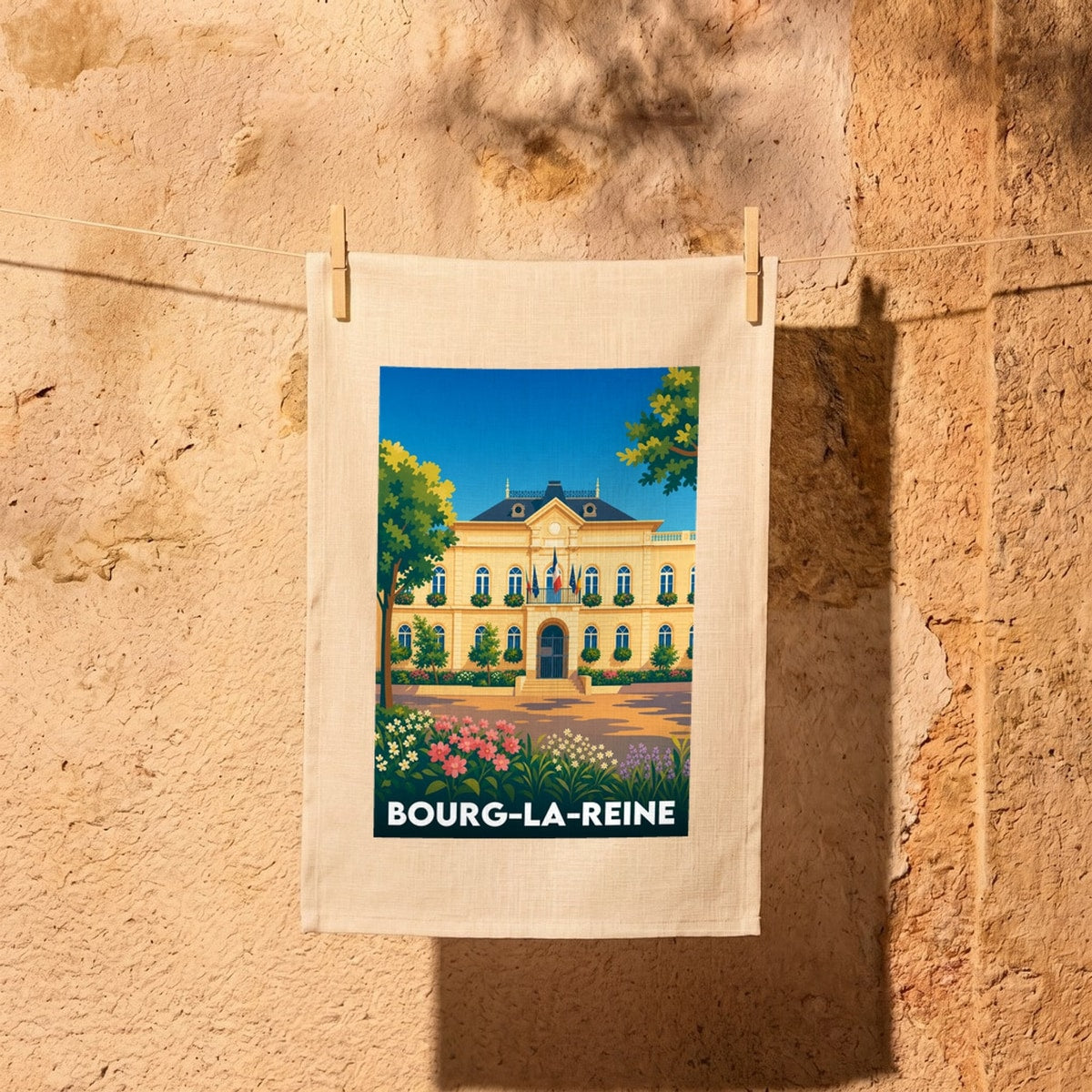 Torchon souvenir de la ville de Bourg-la-Reine avec une illustration stylisée de l'hôtel de ville.