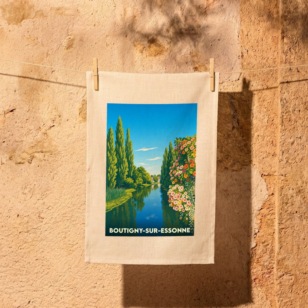 Torchon souvenir de la ville de Boutigny-sur-Essonne avec une illustration colorée et stylisée de ses paysages.