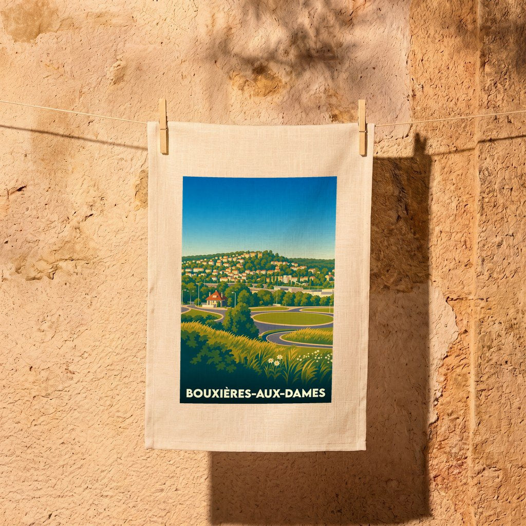 Torchon souvenir de la ville de Bouxières-aux-Dames avec une illustration paysagère stylisée.