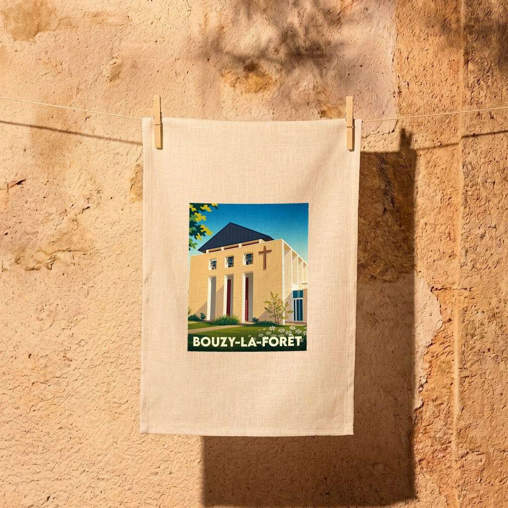 Torchon souvenir de la ville de Bouzy-la-Forêt avec une illustration stylisée de son église moderne.