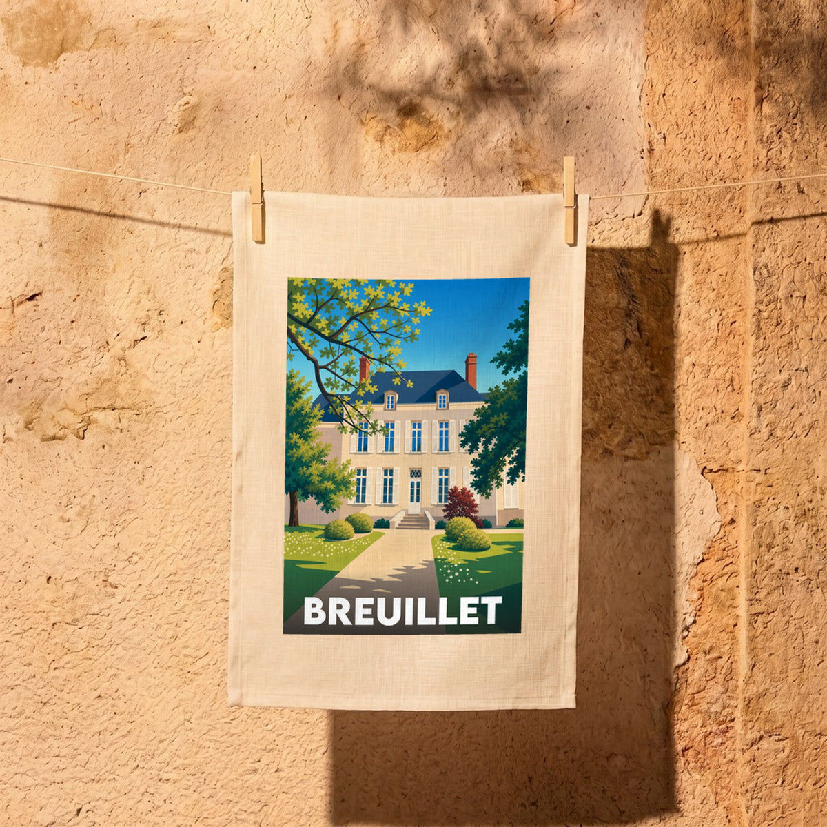 Torchon souvenir de la ville de Breuillet orné d'une illustration stylisée de sa mairie.