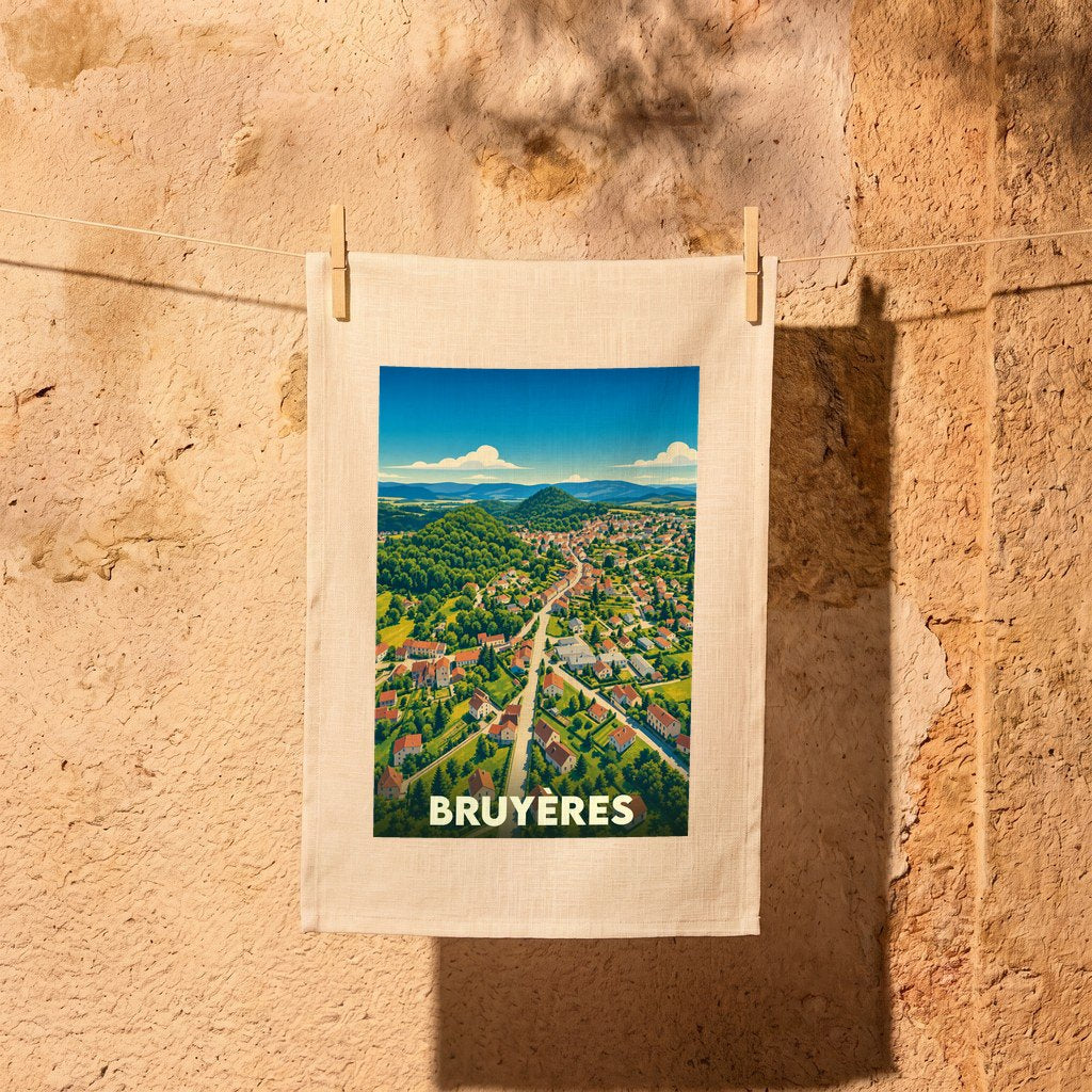 Torchon souvenir de la ville de Bruyères orné d'une illustration panoramique stylisée.
