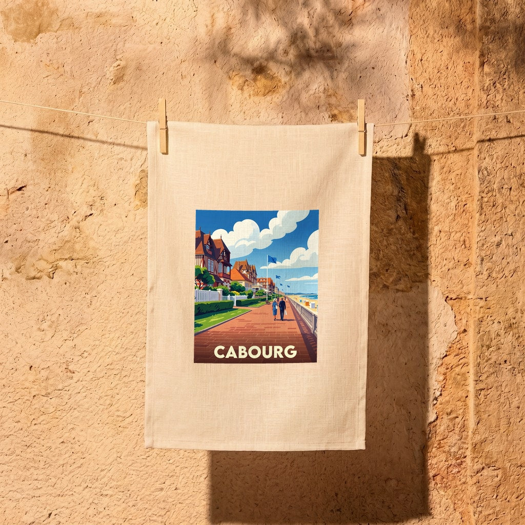 Torchon souvenir de la ville de Cabourg avec une illustration stylisée de son front de mer.