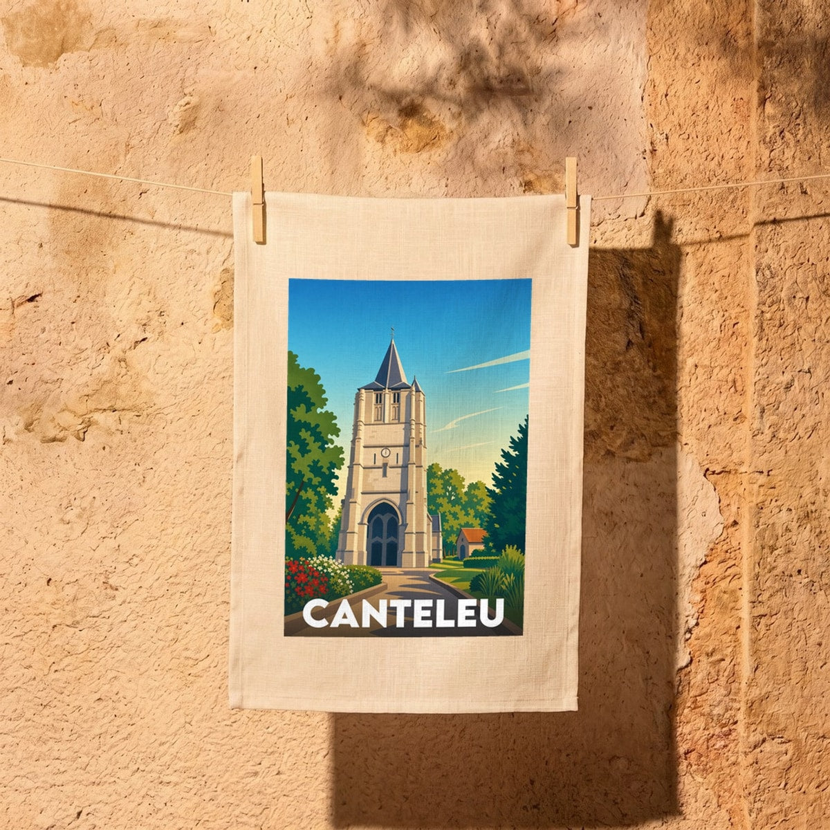 Torchon souvenir de la ville de Canteleu orné d'une illustration stylisée de son église.