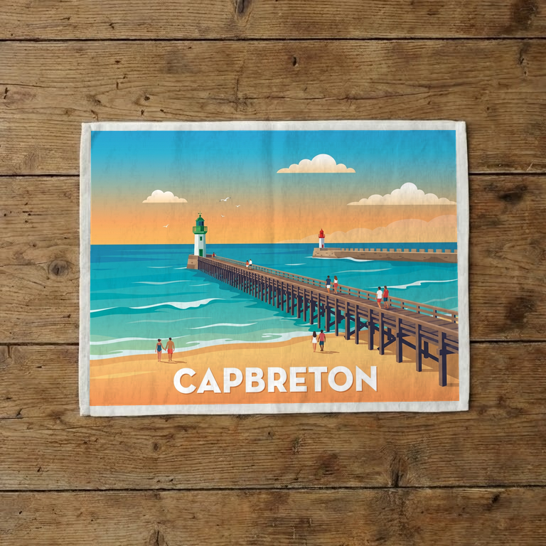 Torchon souvenir de la ville de Capbreton avec une illustration stylisée de son estacade au bord de l'océan.
