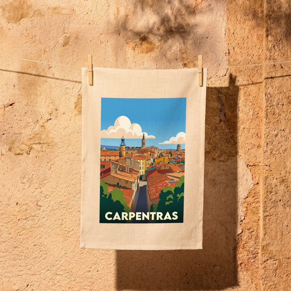 Torchon souvenir de la ville de Carpentras avec une illustration stylisée de ses toits et clochers.
