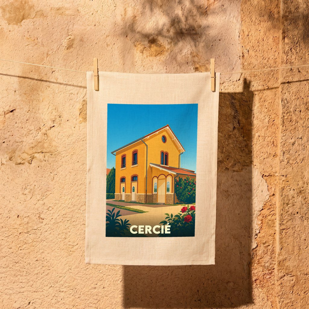 Torchon souvenir de la ville de Cercié avec une illustration stylisée de son ancienne gare.