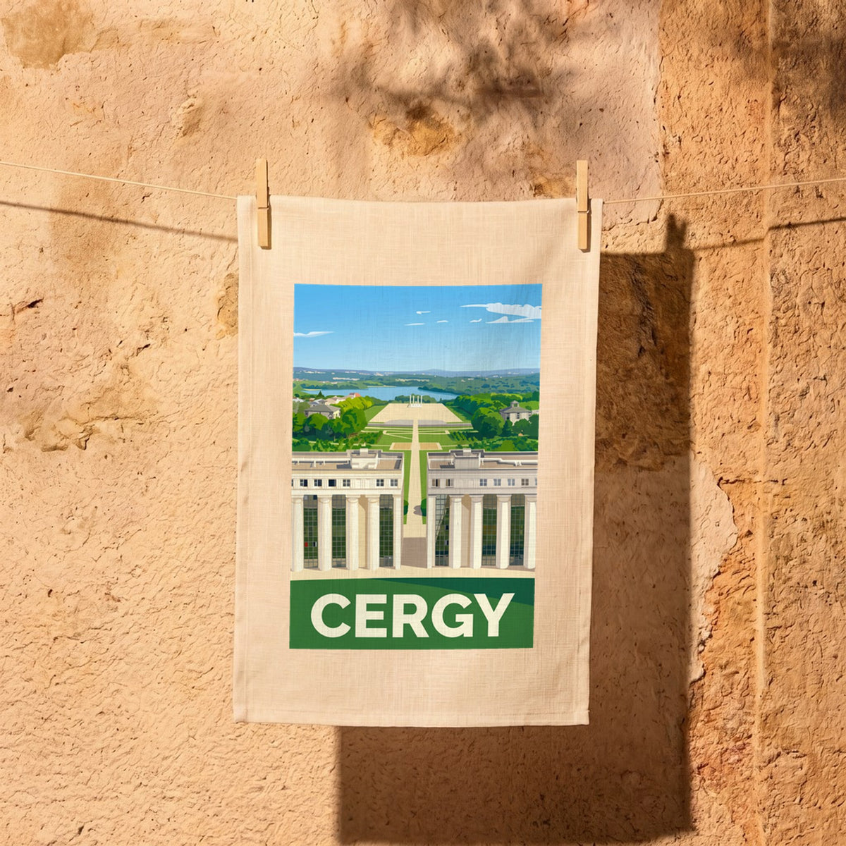 Torchon souvenir de la ville de Cergy avec une illustration stylisée de l'Axe Majeur.