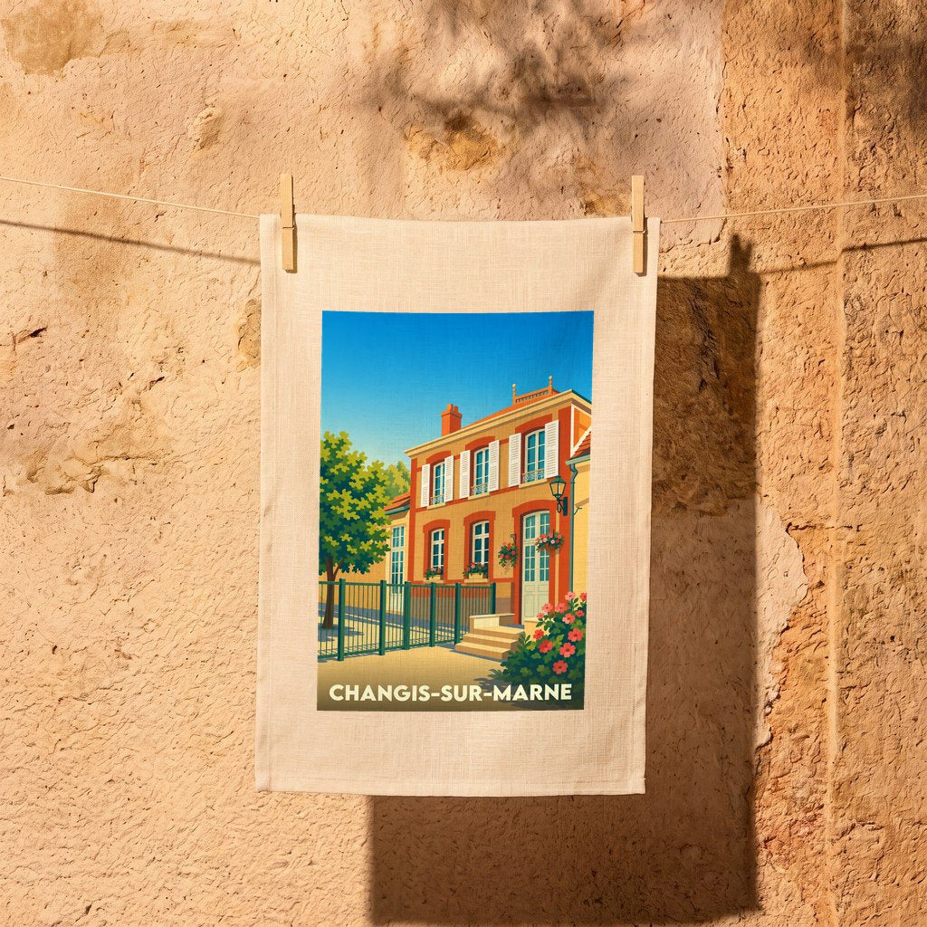 Torchon souvenir de la ville de Changis-sur-Marne avec une illustration stylisée d'une maison briarde.