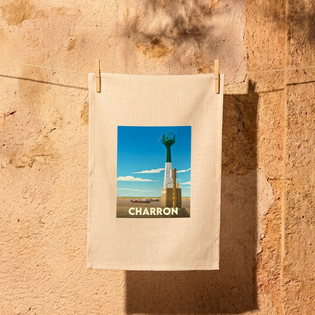 Torchon souvenir de la ville de Charron avec une illustration stylisée de son phare côtier.