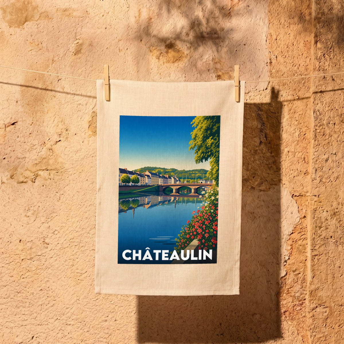 Torchon souvenir de la ville de Châteaulin avec une illustration stylisée.