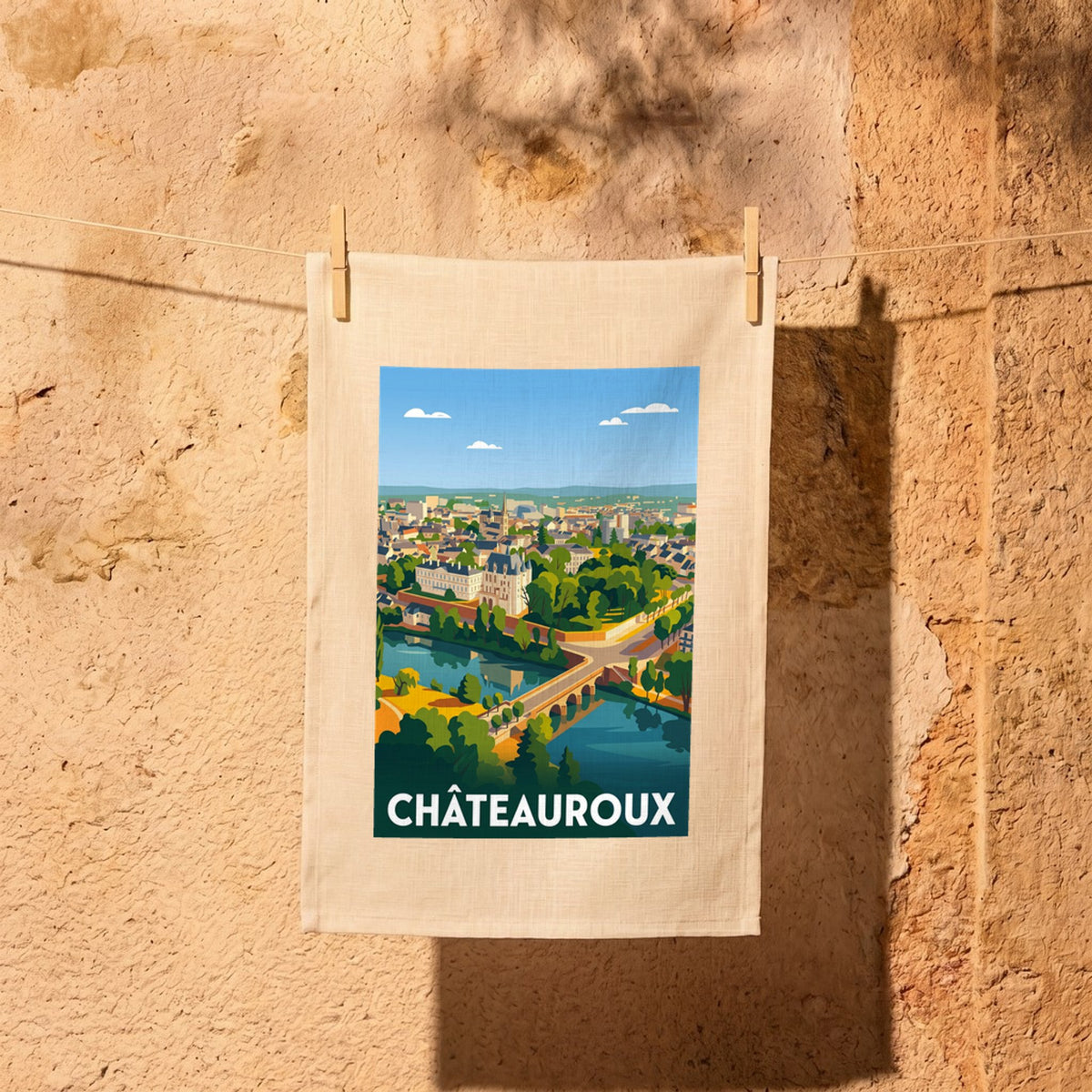 Torchon souvenir de la ville de Châteauroux avec une illustration stylisée.