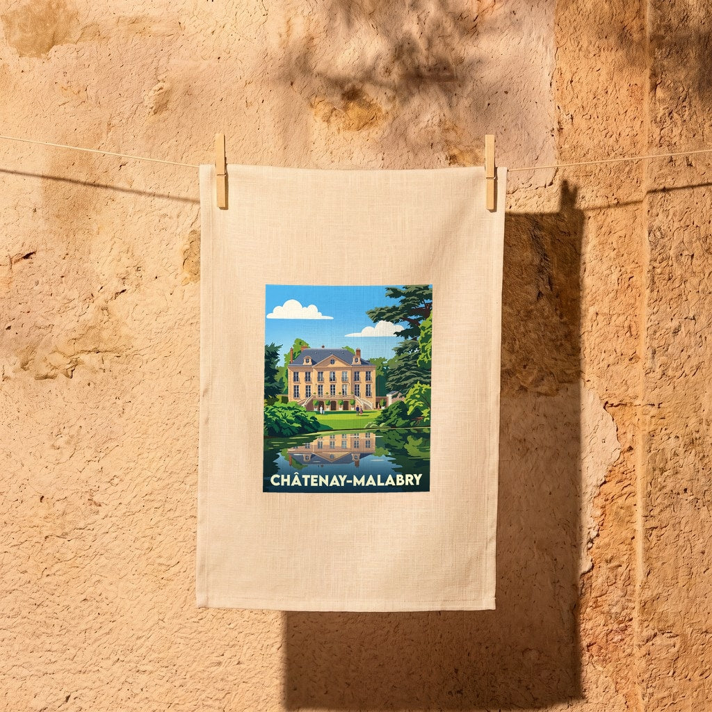 Torchon souvenir de la ville de Châtenay-Malabry avec une illustration colorée d'un manoir se reflétant dans l'eau.