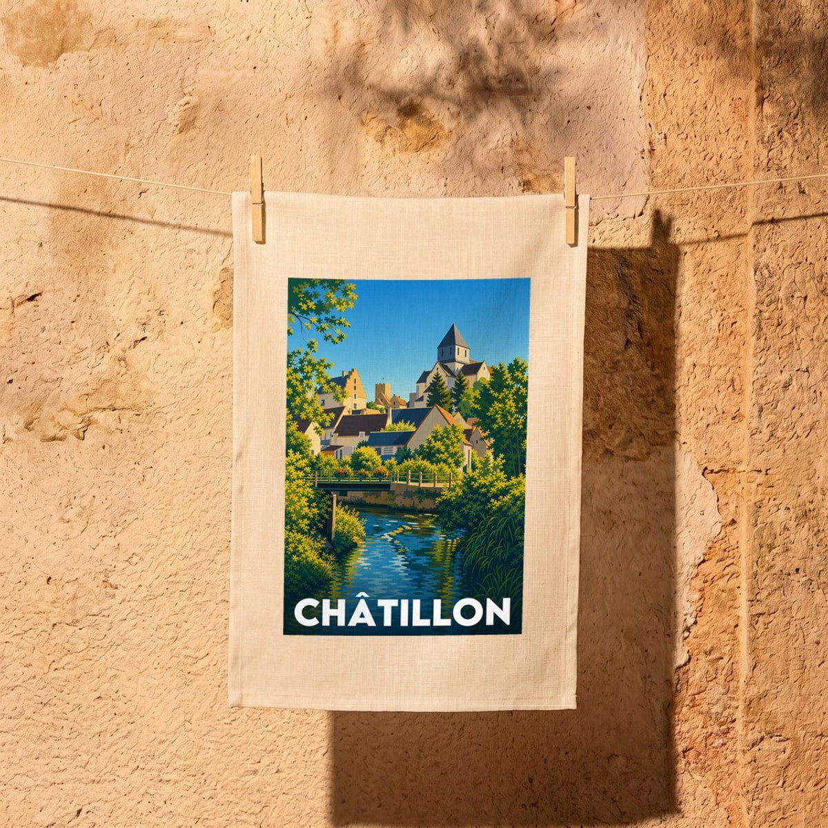 Torchon souvenir de la ville de Châtillon avec une illustration stylisée du paysage urbain.