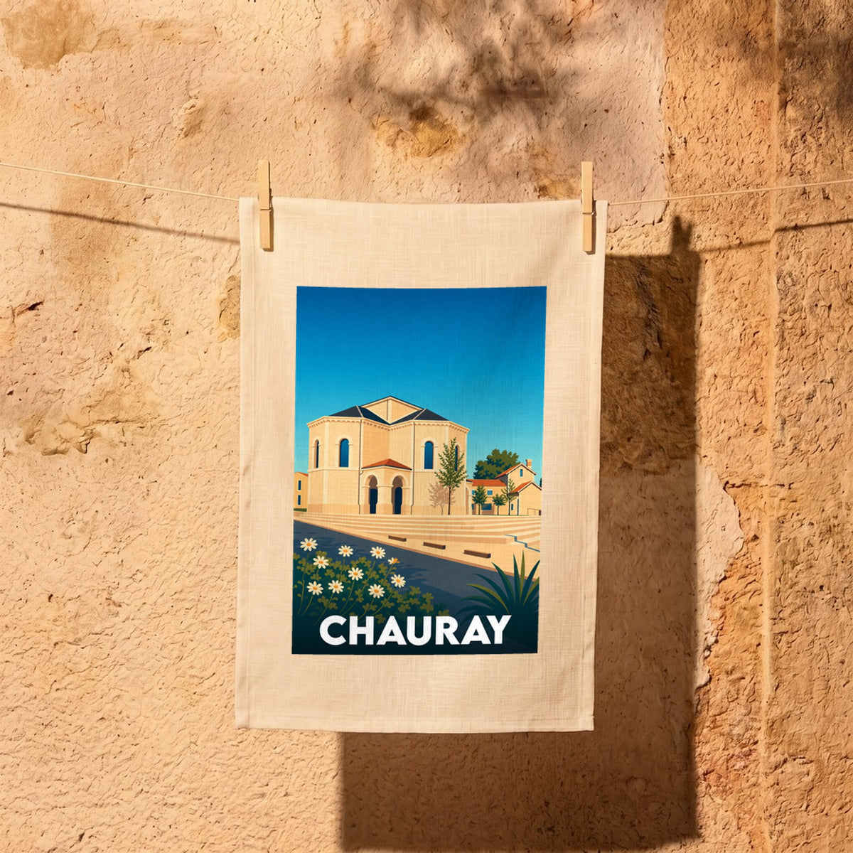 Torchon souvenir de la ville de Chauray avec une illustration stylisée de son église et de sa place.
