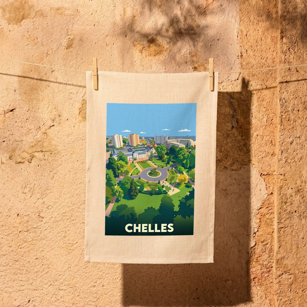 Torchon souvenir de la ville de Chelles avec une illustration stylisée d'un parc et de bâtiments.