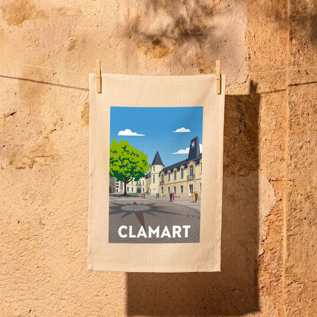 Torchon souvenir de la ville de Clamart avec une illustration stylisée de sa place centrale.