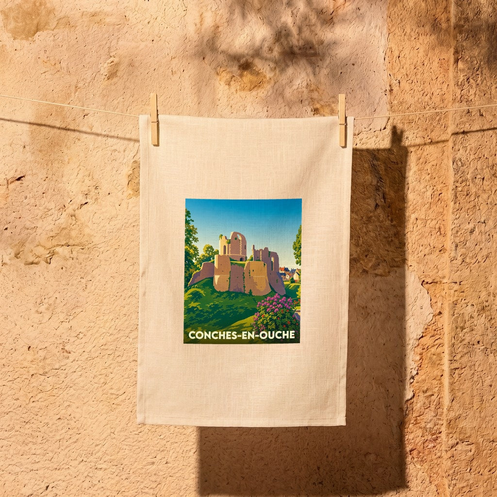 Torchon souvenir de la ville de Conches-en-Ouche avec une illustration stylisée de son château médiéval.
