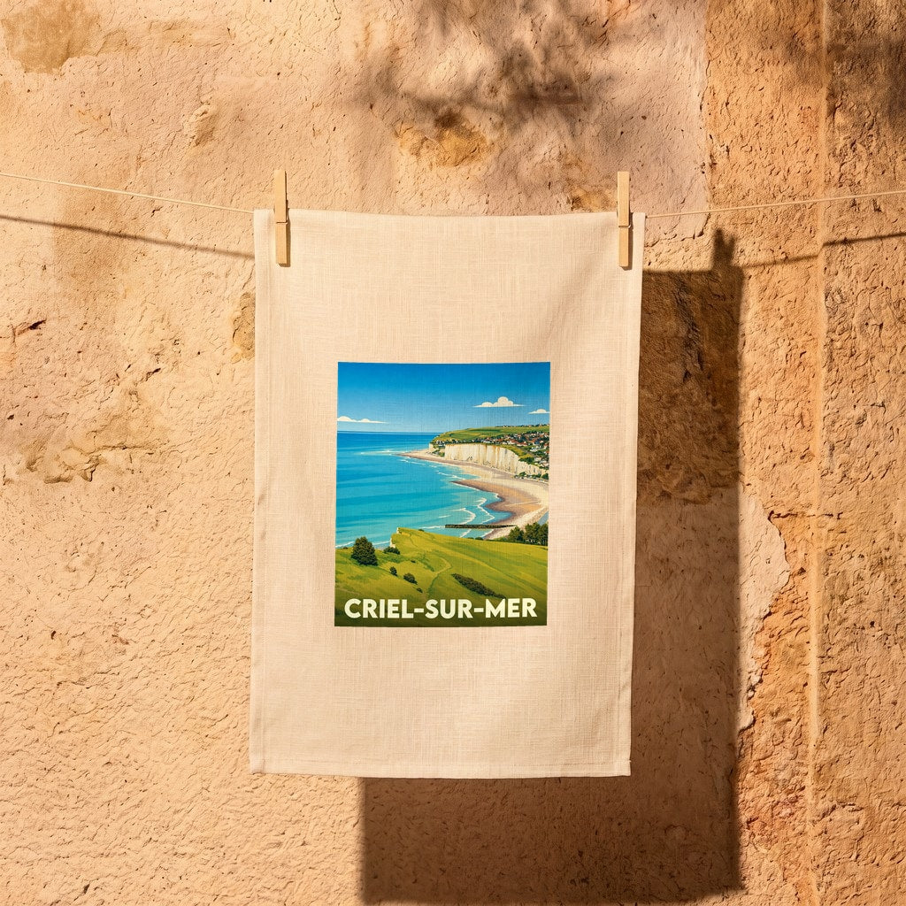 Torchon souvenir de la ville de Criel-sur-Mer avec une illustration stylisée de son littoral.