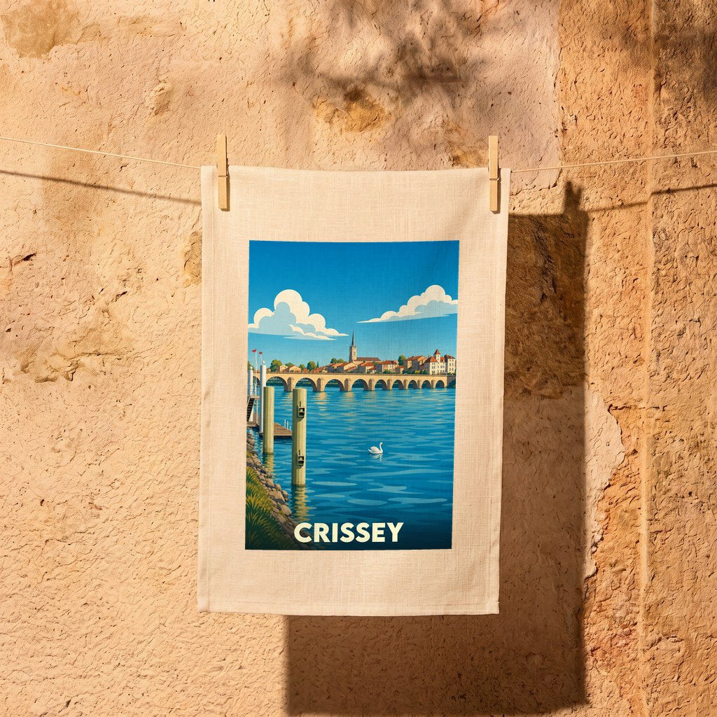 Torchon souvenir de la ville de Crissey avec une illustration stylisée d'un paysage fluvial.