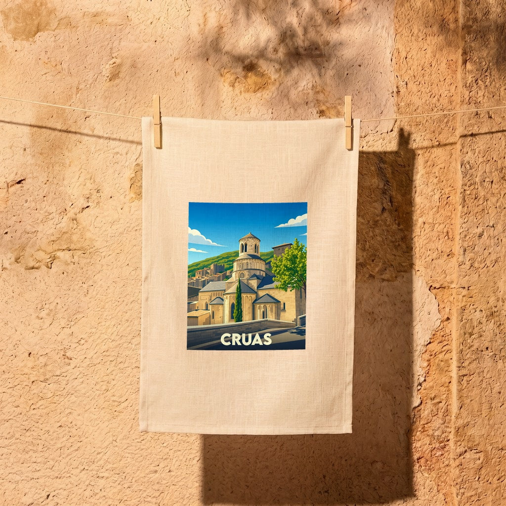 Torchon souvenir de la ville de Cruas avec une illustration stylisée de son église abbatiale.