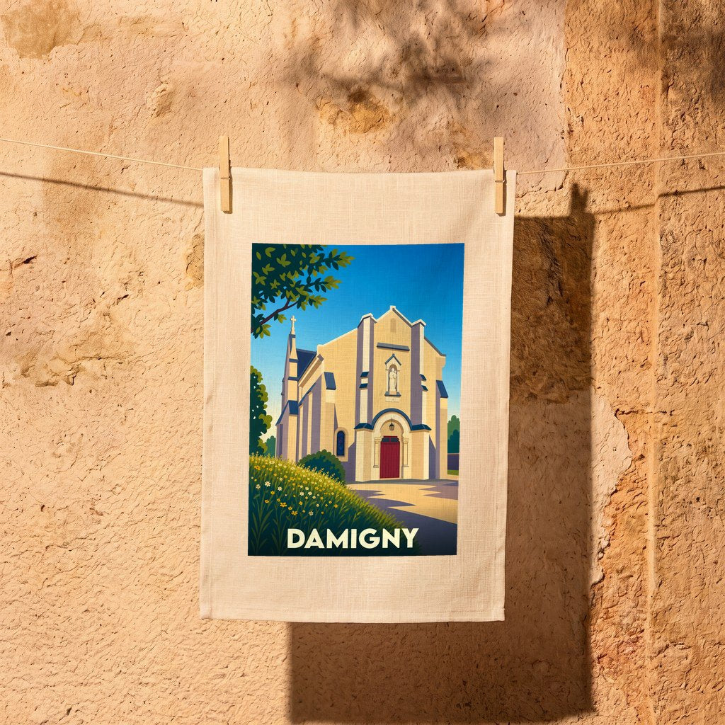 Torchon souvenir de la ville de Damigny avec une illustration stylisée de son église.