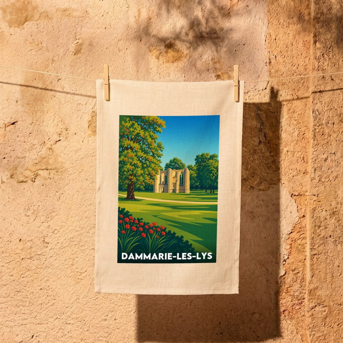 Torchon souvenir de la ville de Dammarie-les-Lys avec une illustration stylisée.