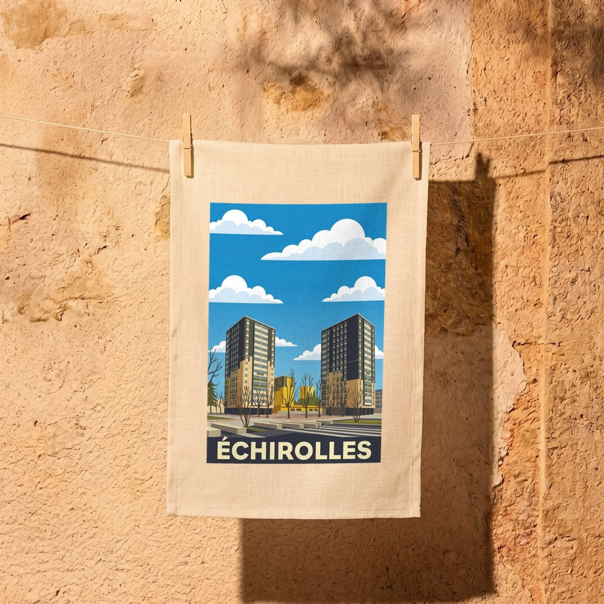 Torchon souvenir de la ville de Échirolles avec une illustration stylisée.