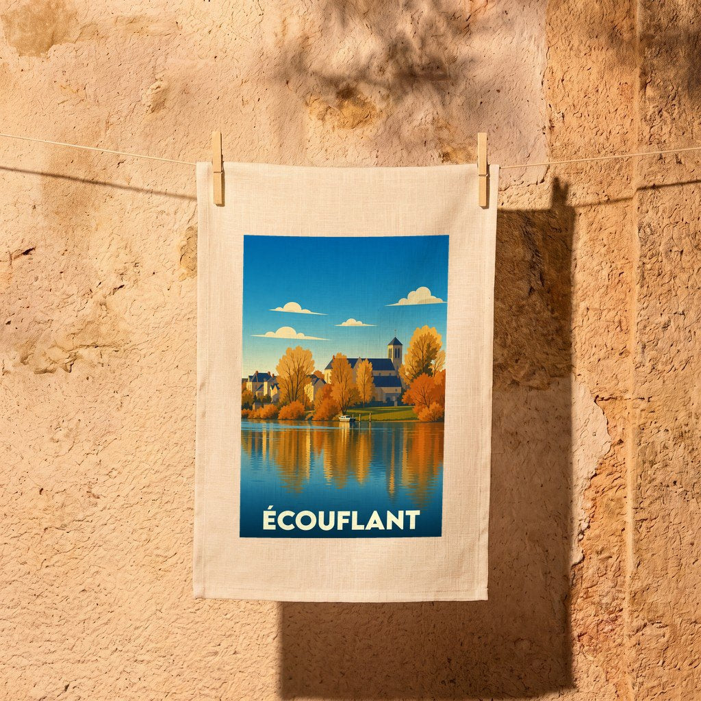 Torchon souvenir de la ville d'Écouflant avec une illustration stylisée d'un paysage d'automne au bord de l'eau.