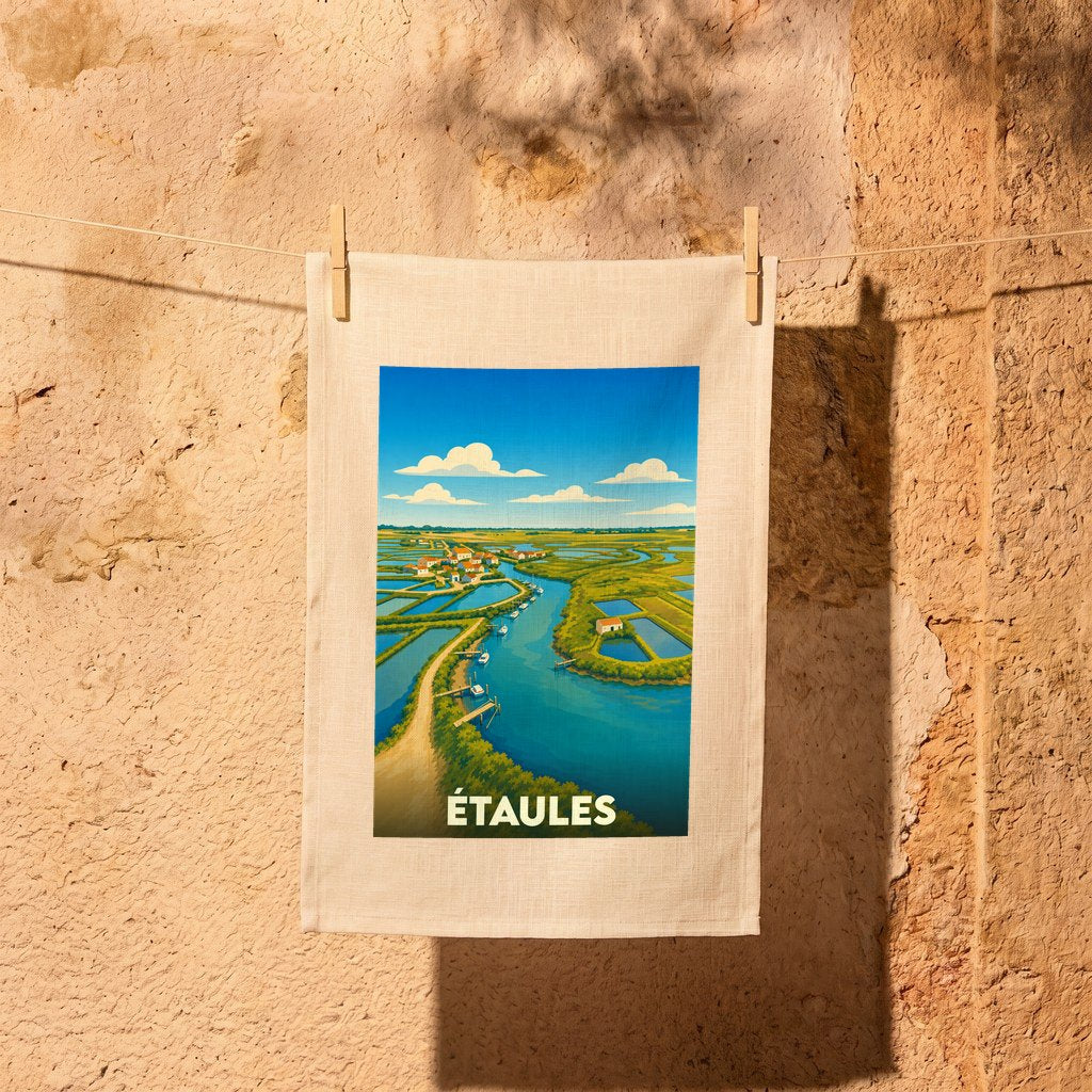 Torchon souvenir de la ville d'Étaules illustrant ses marais ostréicoles sous un ciel bleu.