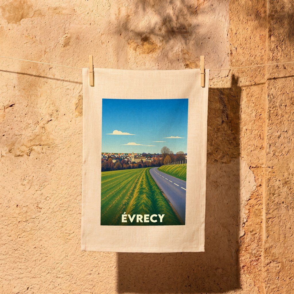 Torchon souvenir de la ville d'Évrecy avec une illustration stylisée de son paysage rural.
