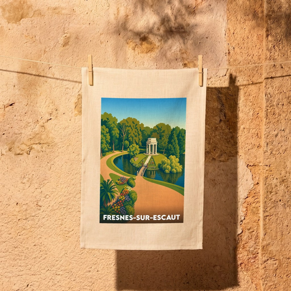 Torchon souvenir de la ville de Fresnes-sur-Escaut illustré par un parc paysager avec un kiosque à colonnes.
