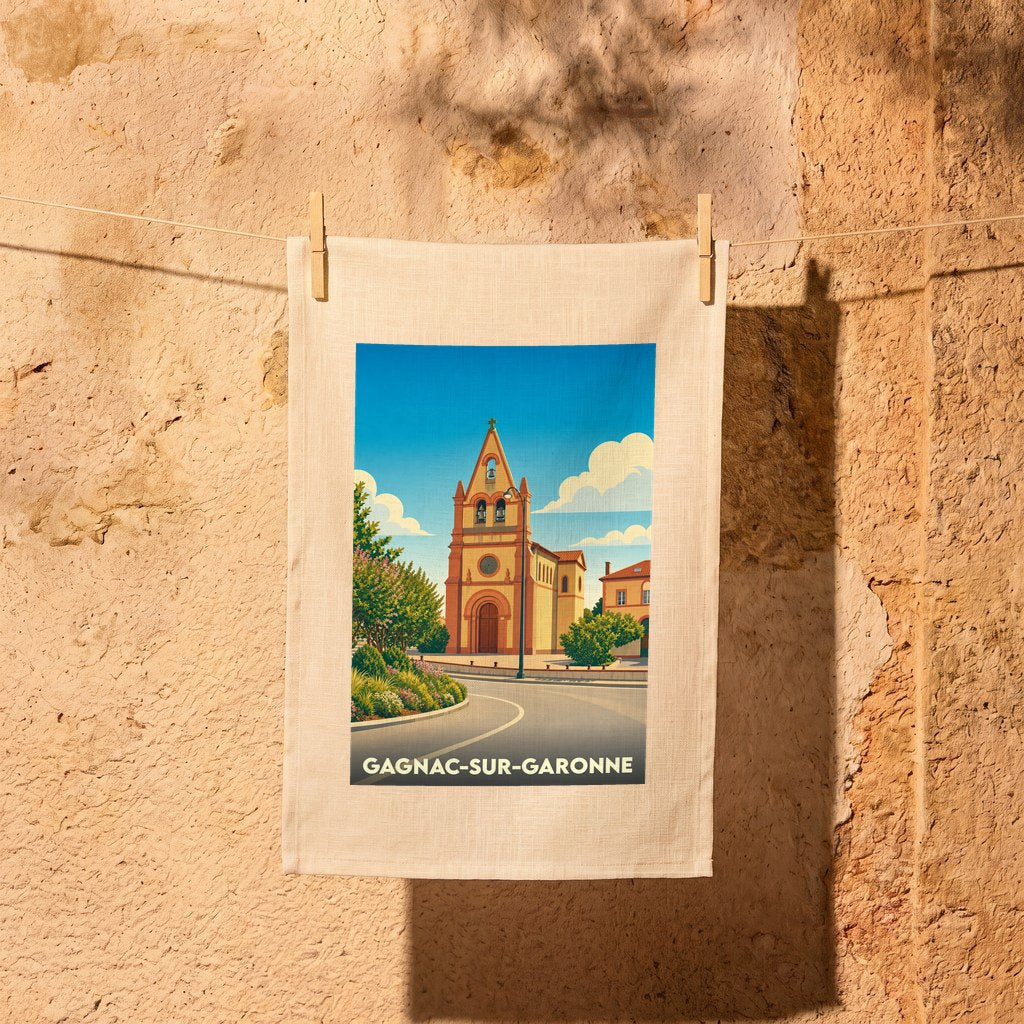 Torchon souvenir de Gagnac-sur-Garonne avec une illustration stylisée de son église sous un ciel bleu.