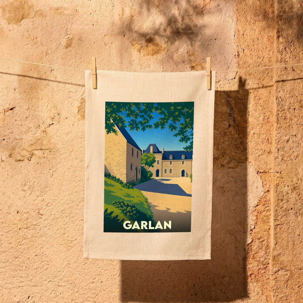 Torchon souvenir de la ville de Garlan orné d'une illustration stylisée de son architecture.