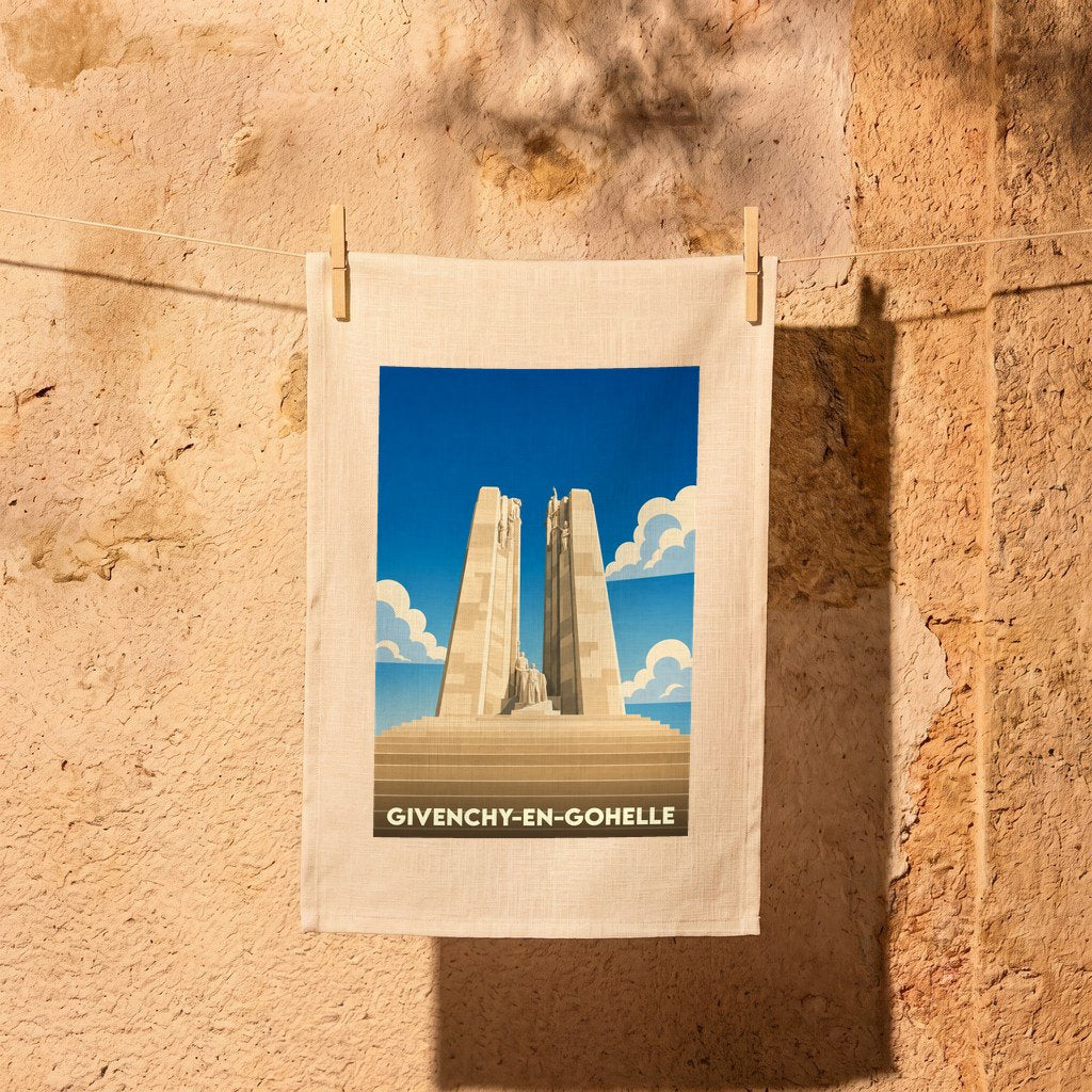 Torchon souvenir de la ville de Givenchy-en-Gohelle illustré d'un monument stylisé sous un ciel bleu.