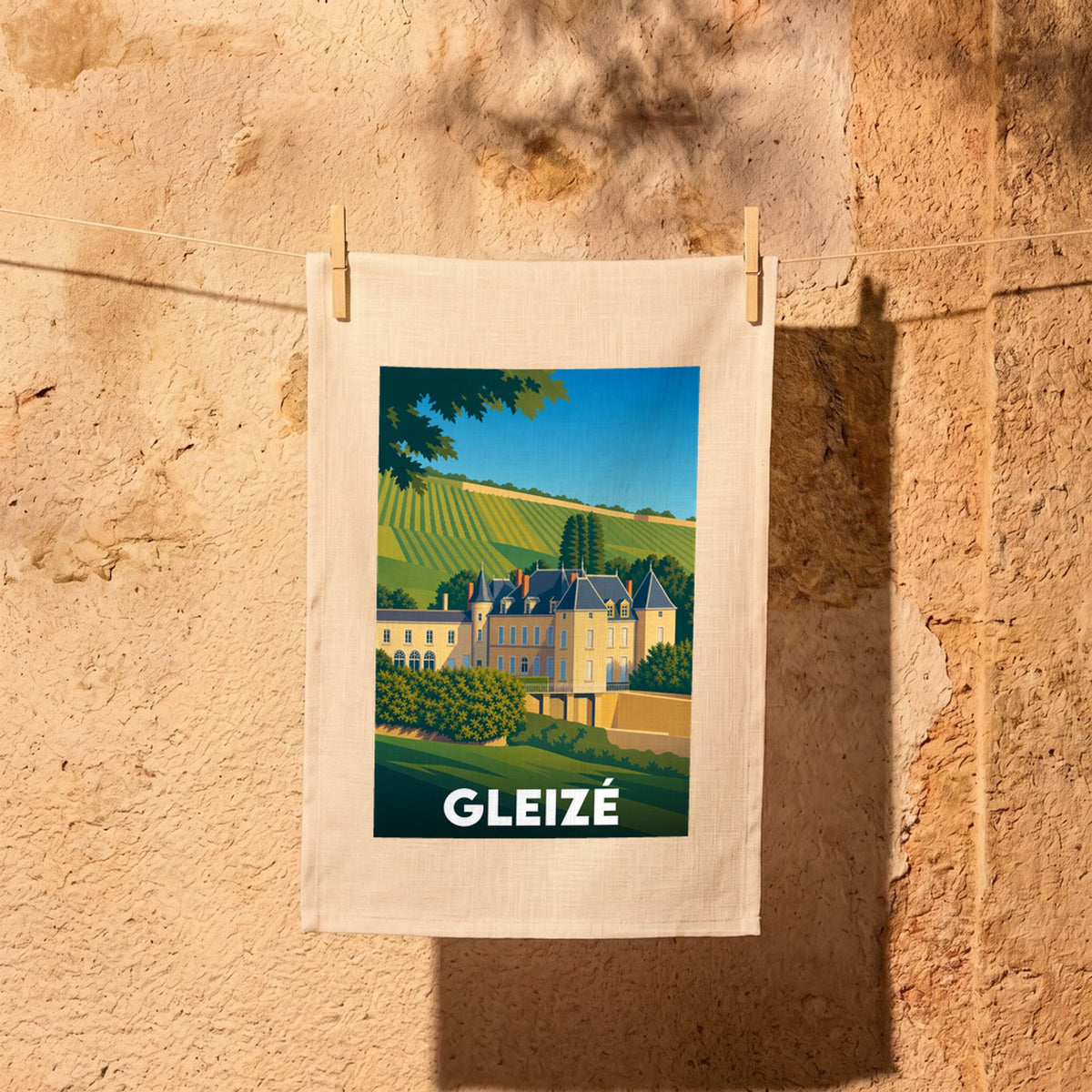 Torchon souvenir de la ville de Gleizé illustré d'un château au cœur du vignoble.