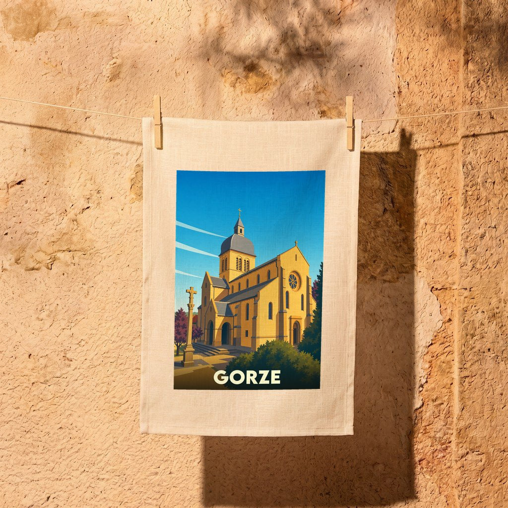 Torchon souvenir de la ville de Gorze avec une illustration stylisée de son église.