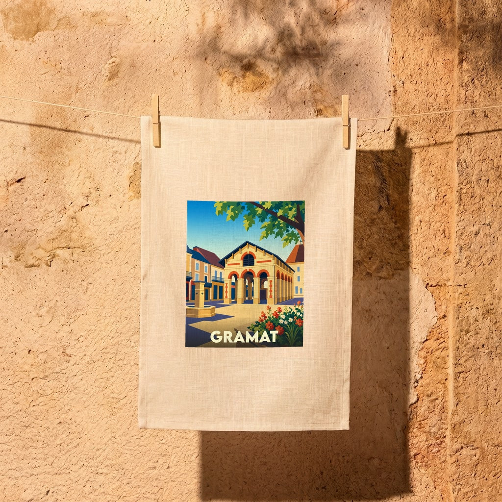 Torchon souvenir de la ville de Gramat avec une illustration stylisée de sa halle.