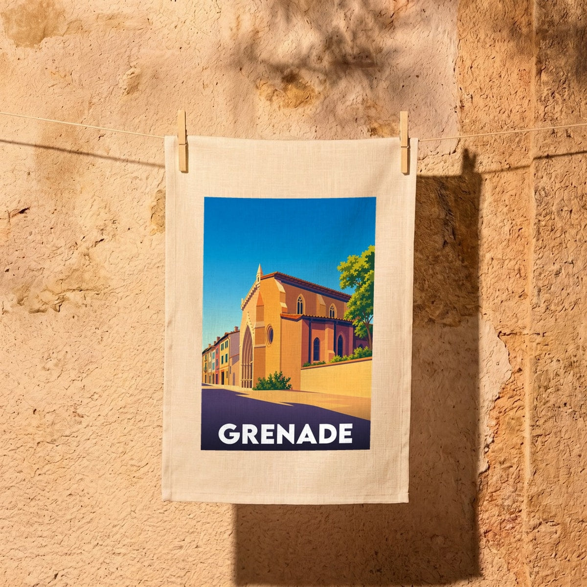 Torchon souvenir de la ville de Grenade illustré d'une église et de façades colorées dans un style rétro.