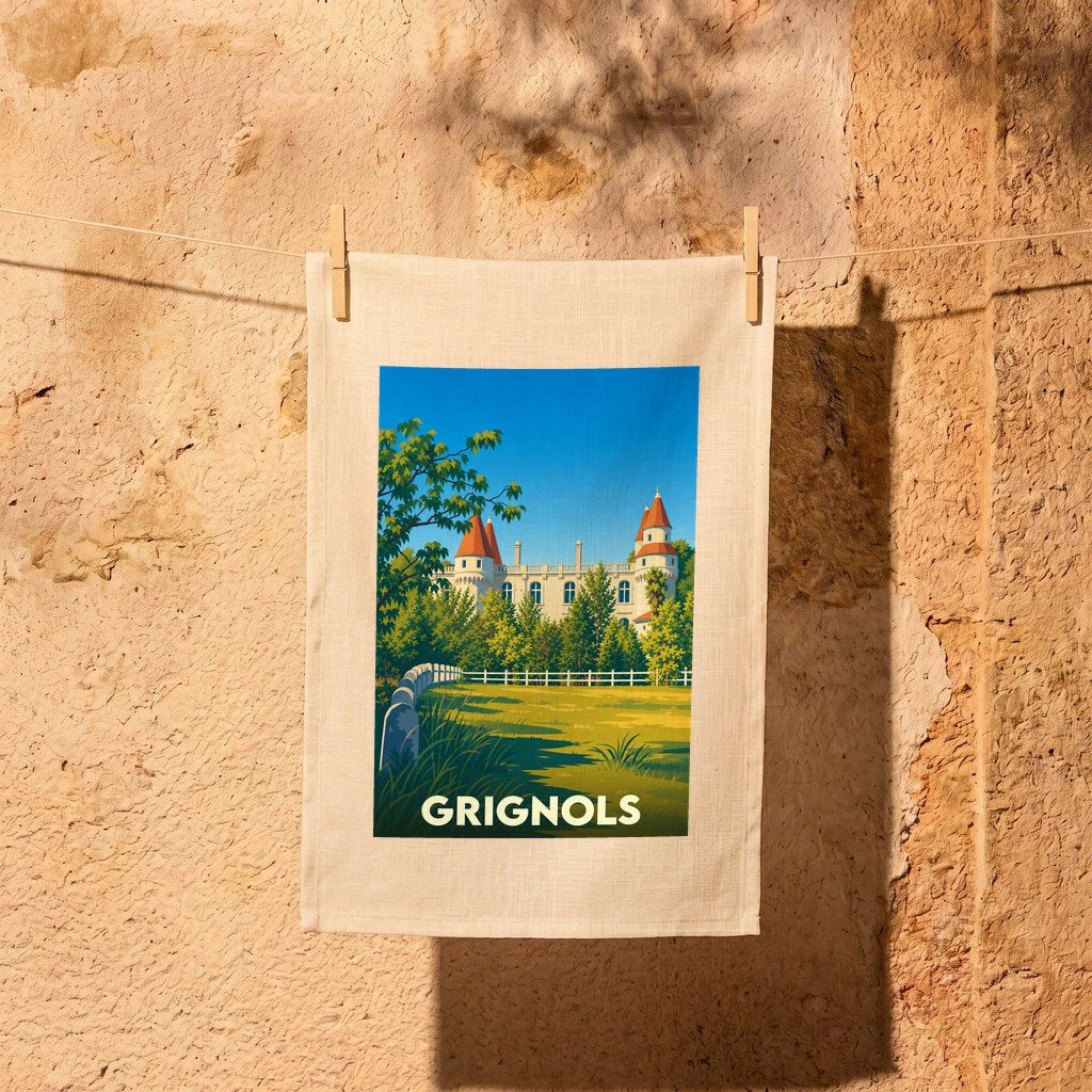 Torchon souvenir de la ville de Grignols avec une illustration stylisée de son château.