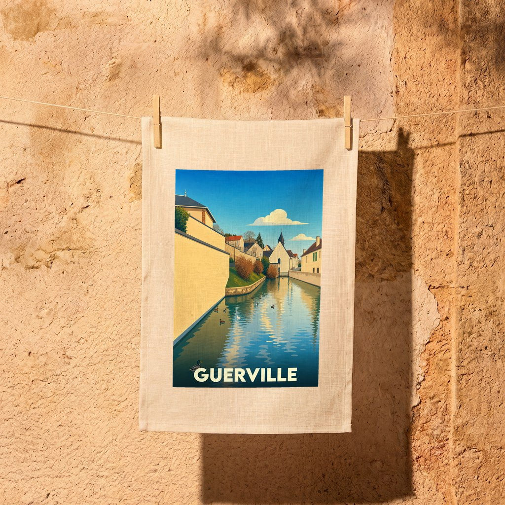 Torchon souvenir de la ville de Guerville avec une illustration stylisée de son canal et de ses bâtiments.