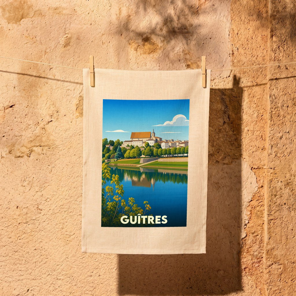 Torchon souvenir de la ville de Guîtres avec une illustration stylisée des bords de l'Isle.