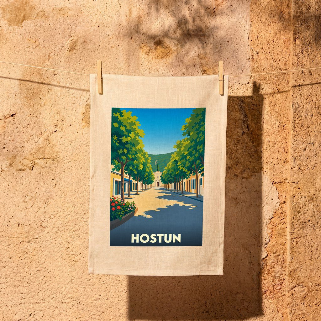 Torchon souvenir de la ville de Hostun illustrant une rue arborée dans un style vintage.