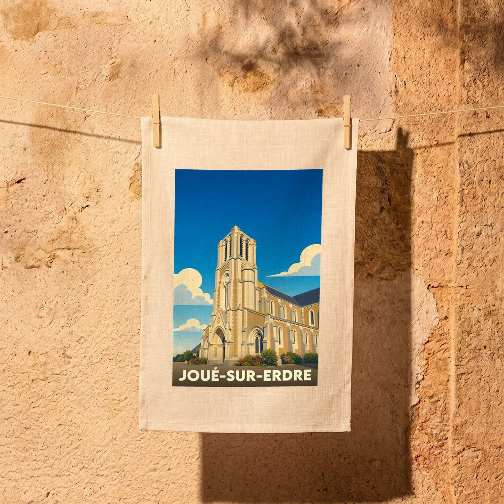 Torchon souvenir de la ville de Joué-sur-Erdre avec une illustration stylisée de son église.