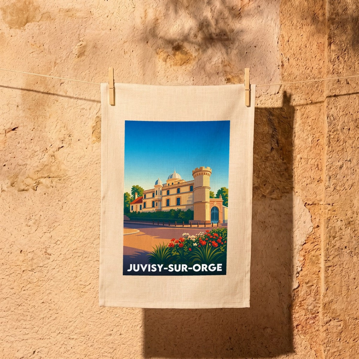Torchon souvenir de la ville de Juvisy-sur-Orge avec une illustration stylisée.