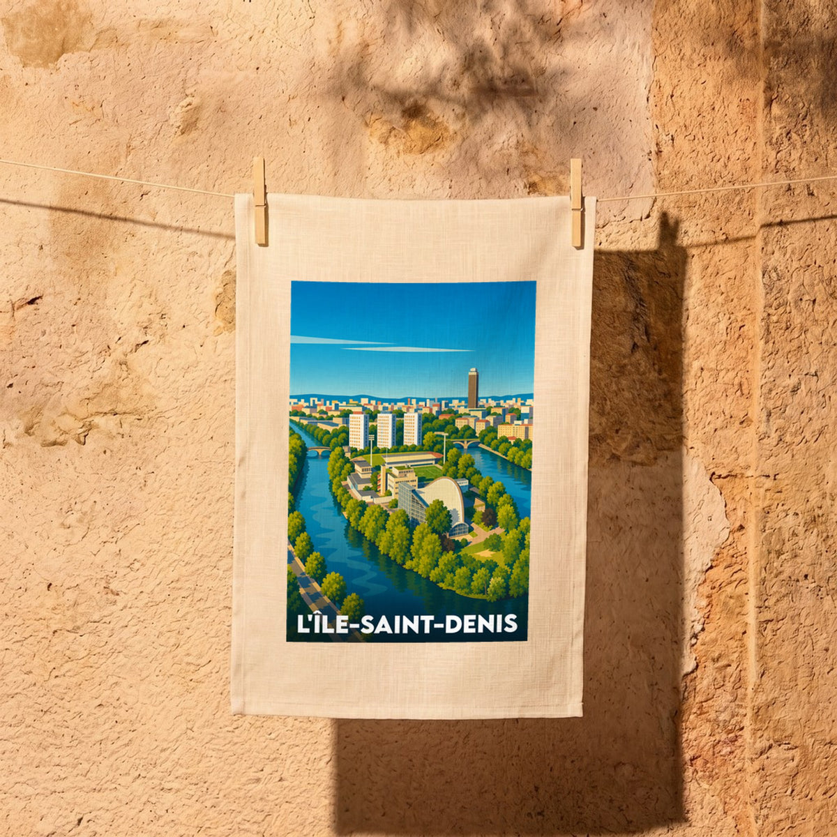 Torchon souvenir de L'Île-Saint-Denis avec une illustration stylisée représentant la ville et la Seine.