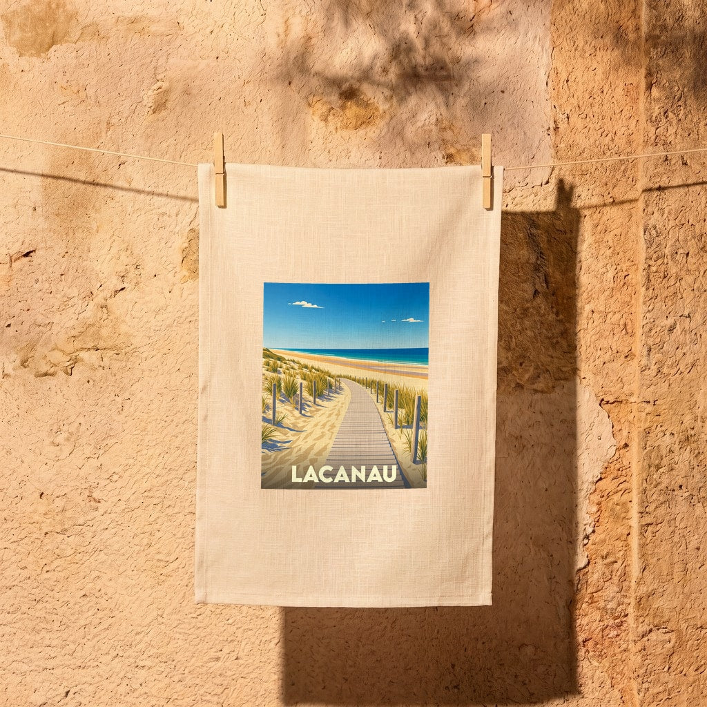 Torchon souvenir de la ville de Lacanau avec une illustration stylisée d'un chemin de plage.