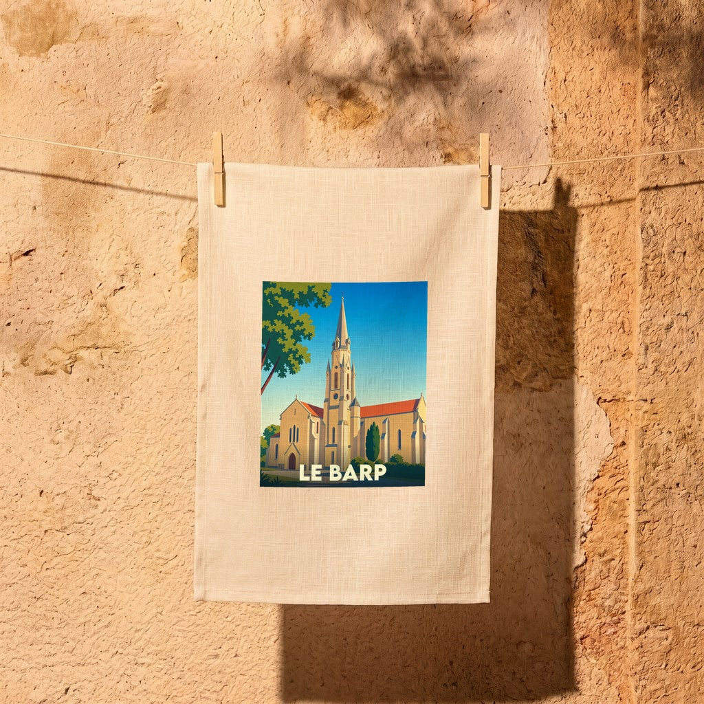 Torchon souvenir de la ville de Le Barp avec une illustration stylisée de son église.