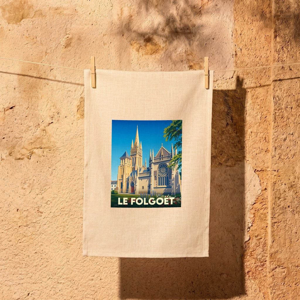 Torchon souvenir de la ville de Le Folgoët illustré d'une église de style gothique sous un ciel bleu.
